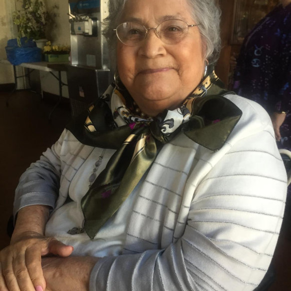 woman and elderly woman smiling